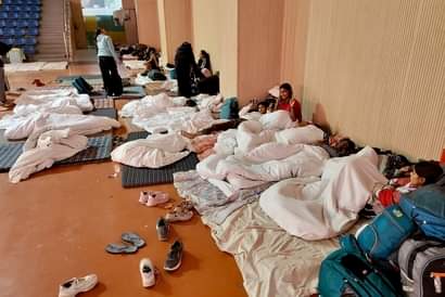 Women players were given thin mattresses... they spent the night on the floor of the volleyball court.