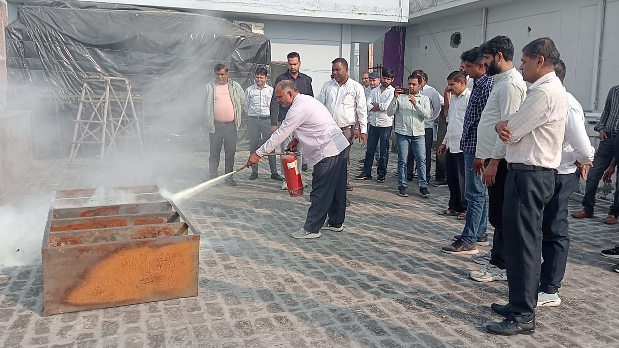 Conducting mock drills to educate employees on fire safety techniques
