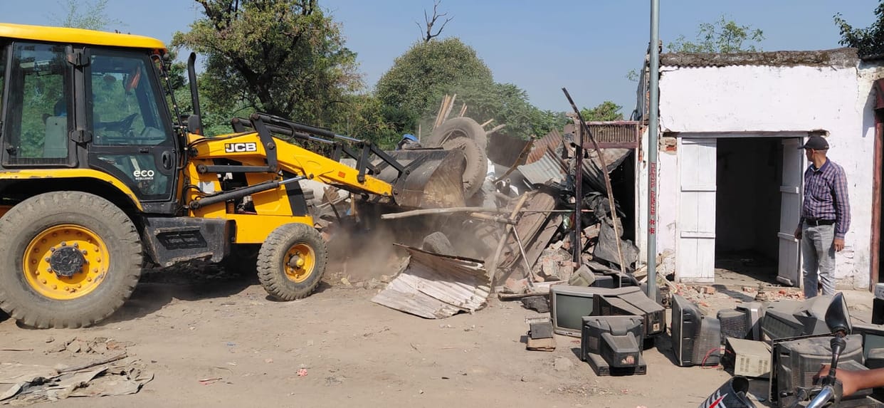 Illegal constructions on railway land demolished with bulldozers