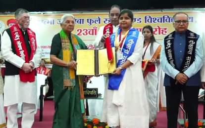 Awarded with gold medal for topping girl students