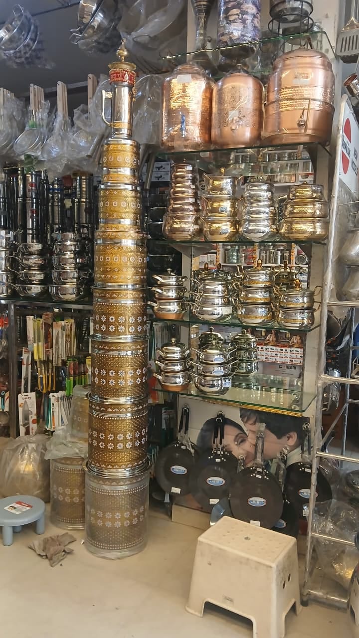 Beautiful carvings on brass utensils