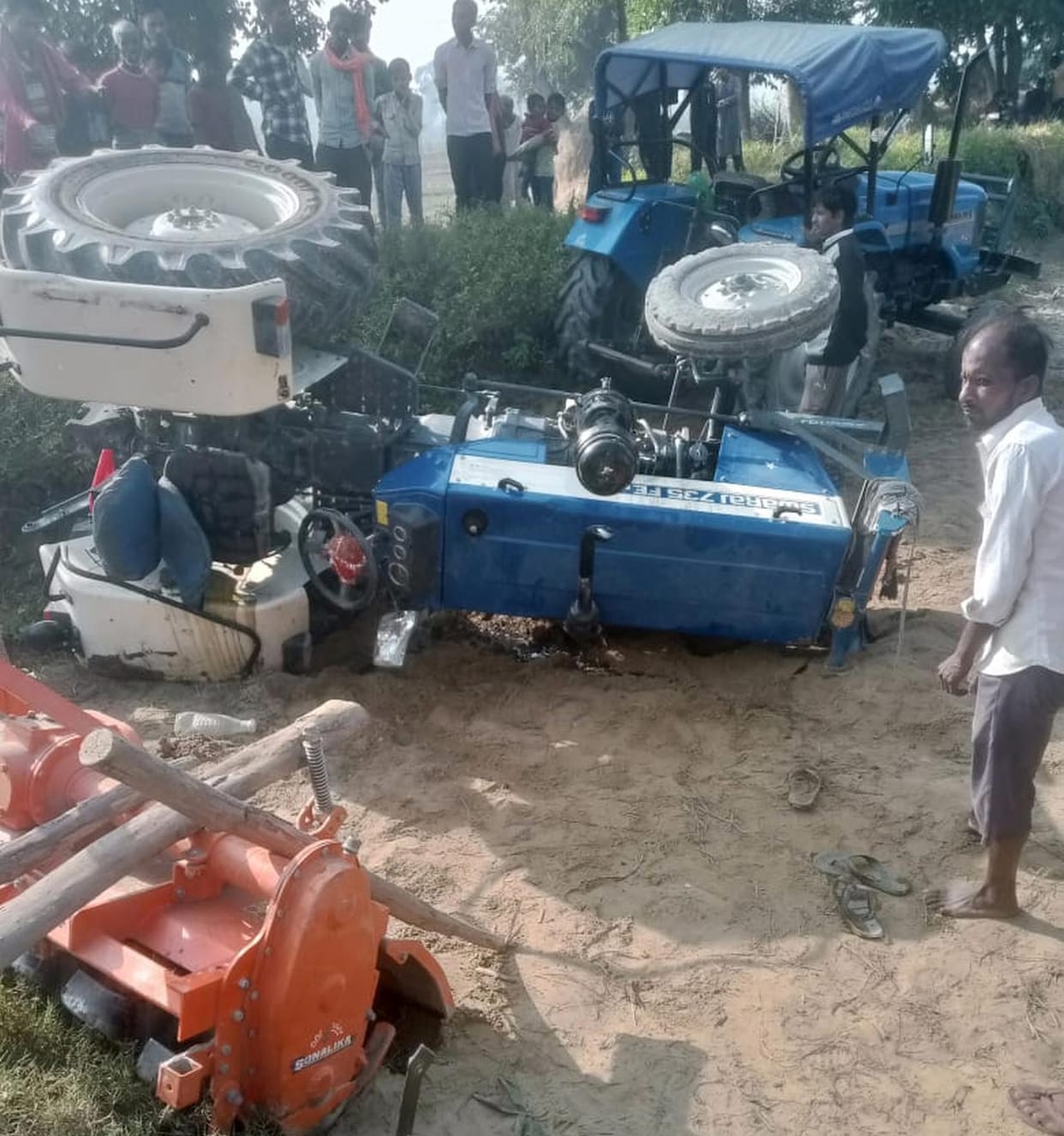 Tractor overturned while ploughing field, driver injured