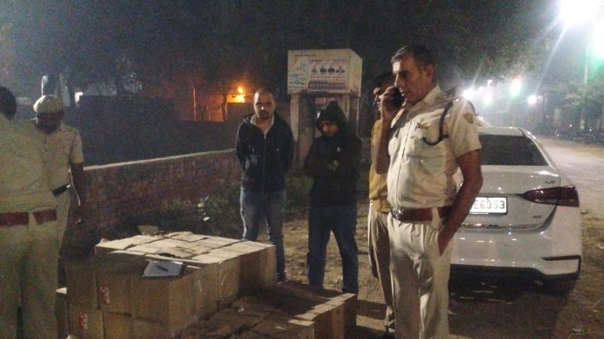 Two youths arrested with 50 boxes of illicit liquor