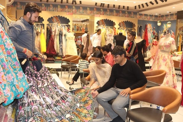 Kolkata's lehenga and Mumbai's sherwani shine.