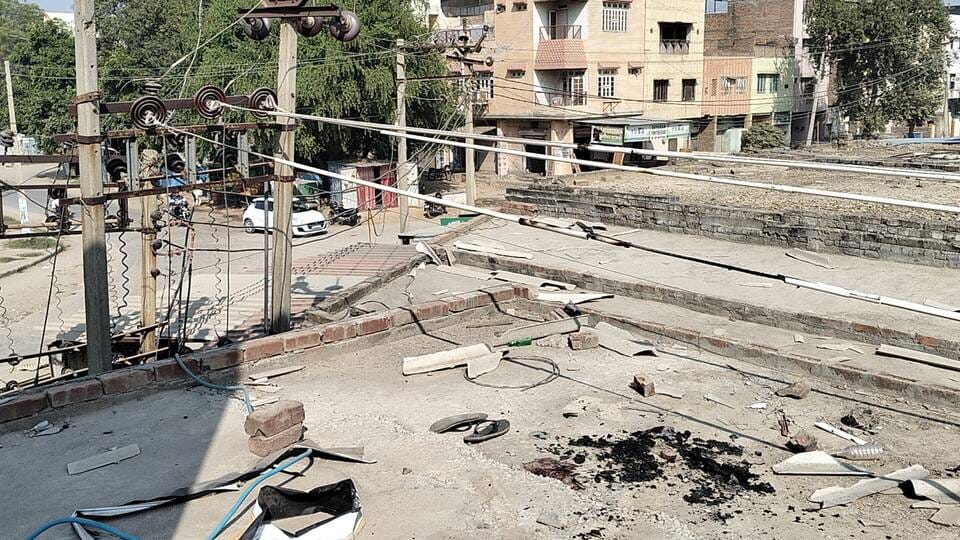 A young man died after being electrocuted on the roof of a shop