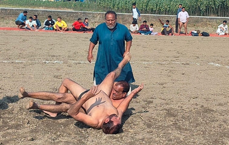 Wrestlers showcase their skills in the wrestling match
