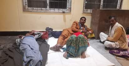 People spending winter nights on the ground in the open...a lock hanging on the night shelter
