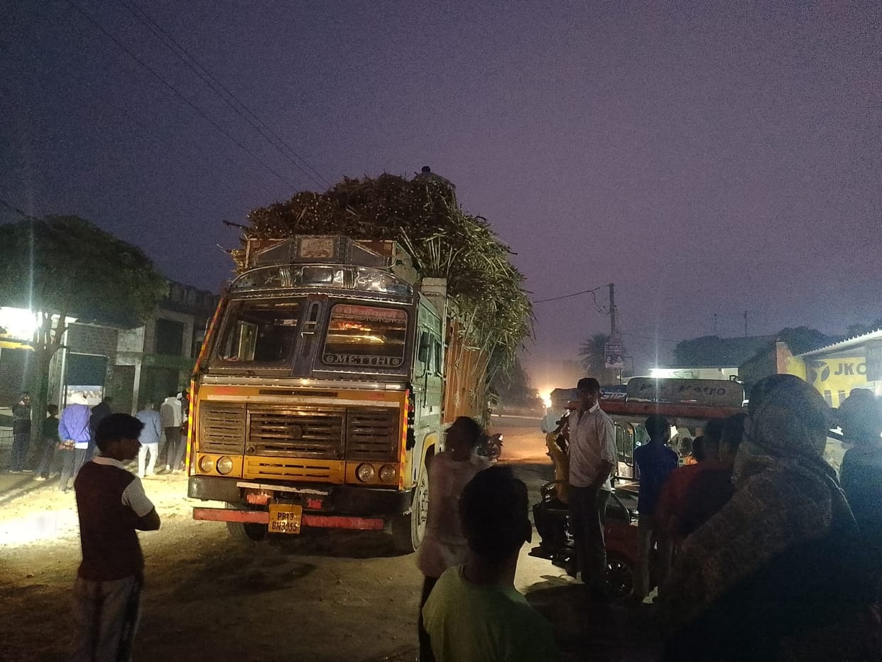 An overloaded truck carrying sugarcane broke wires, causing power outages.