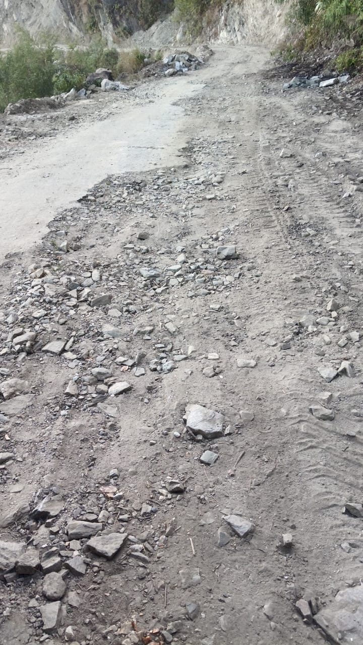 It is difficult for people to walk on the dilapidated Dhaun Bajaun road.