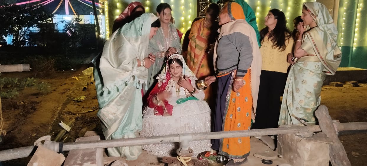 Well worship and community feast on the birth of a granddaughter
