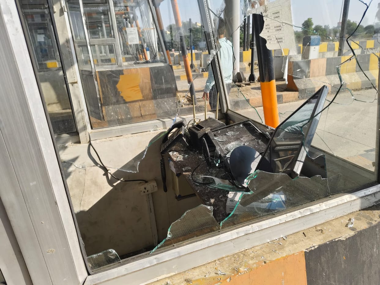 Masked men went on a rampage, smashing windows and computers at toll plazas for not paying extortion money