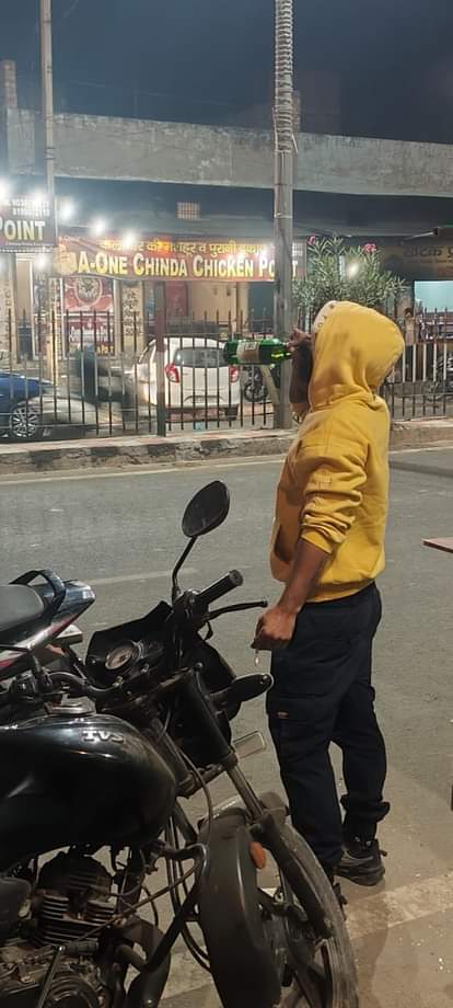 In Kalanaur, liquor spills freely onto the streets as dusk falls.