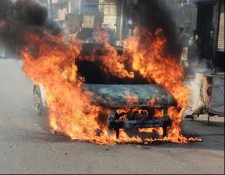 A short circuit caused a moving car to burst into flames