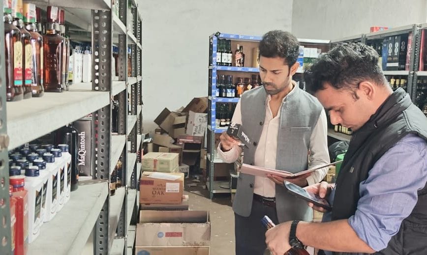Scanning the QR code will reveal the brand and MRP of the liquor.