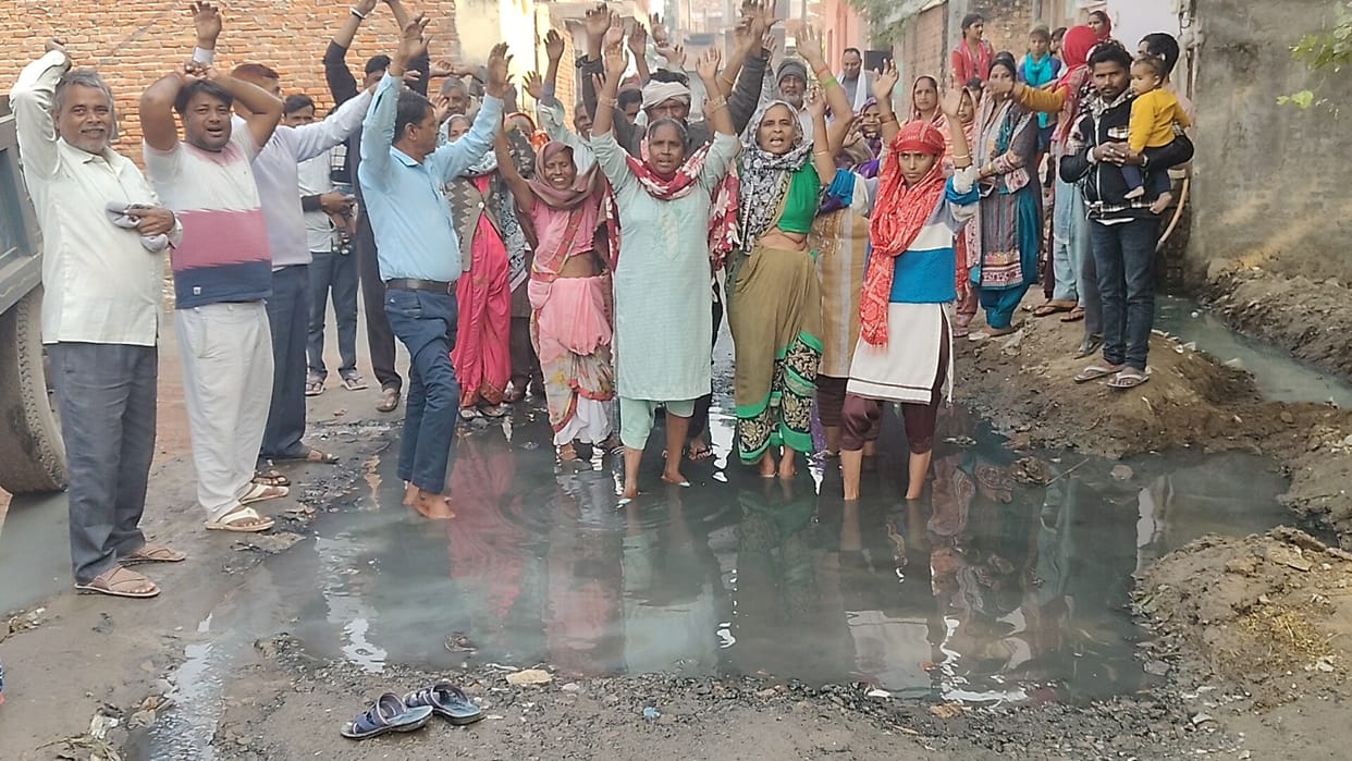 Standing in the mud, the women created a ruckus for two hours.