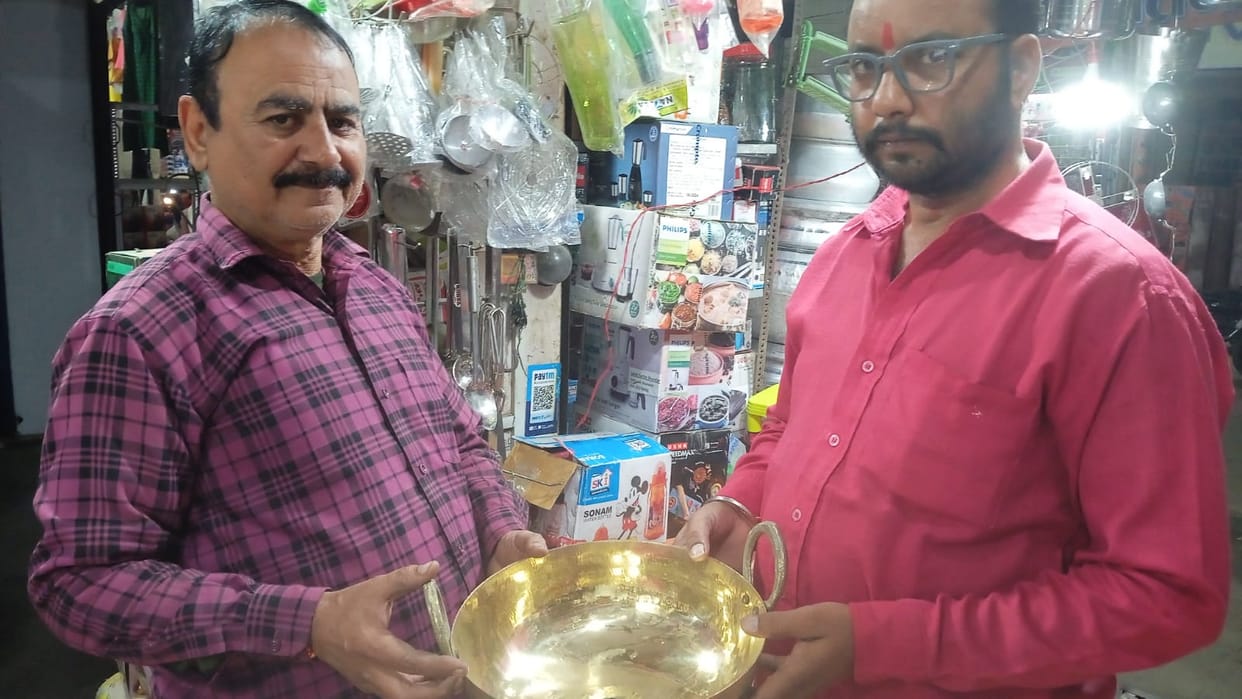 Customers returning to flowers and brass utensils