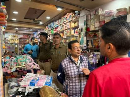 Cash and goods stolen from two shops