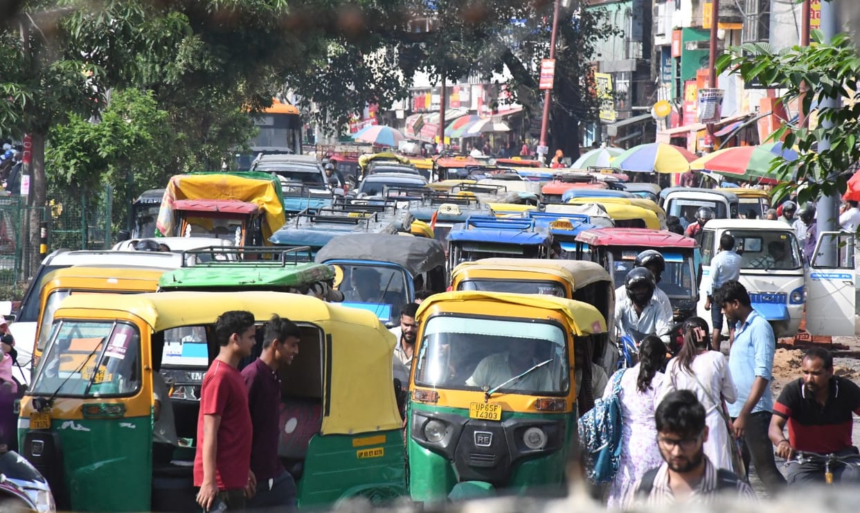 Walking became difficult due to encroachment from the footpath to the road.