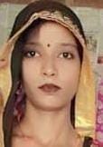Woman's body found hanging, murder charge