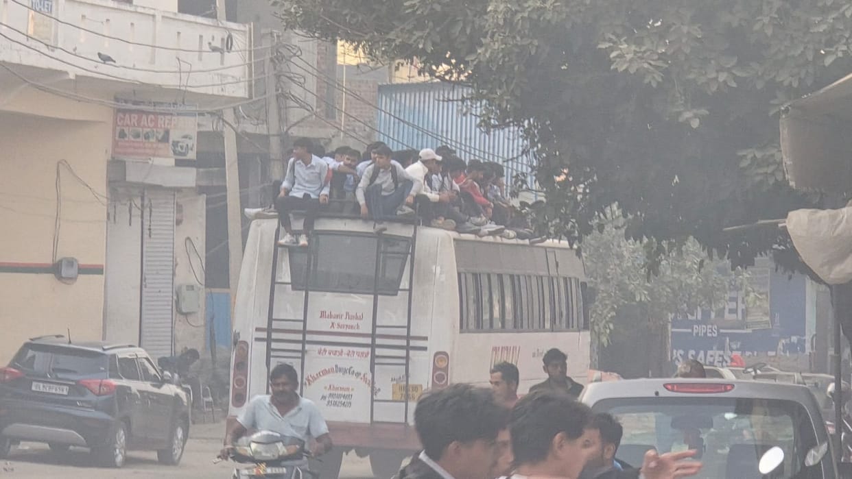 Passengers travelling on the roofs of buses fear accidents