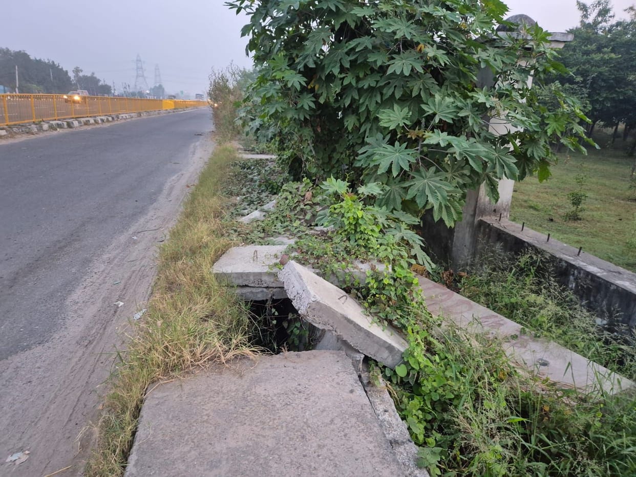 Be careful... open drains along the highway; a slight mistake could be fatal