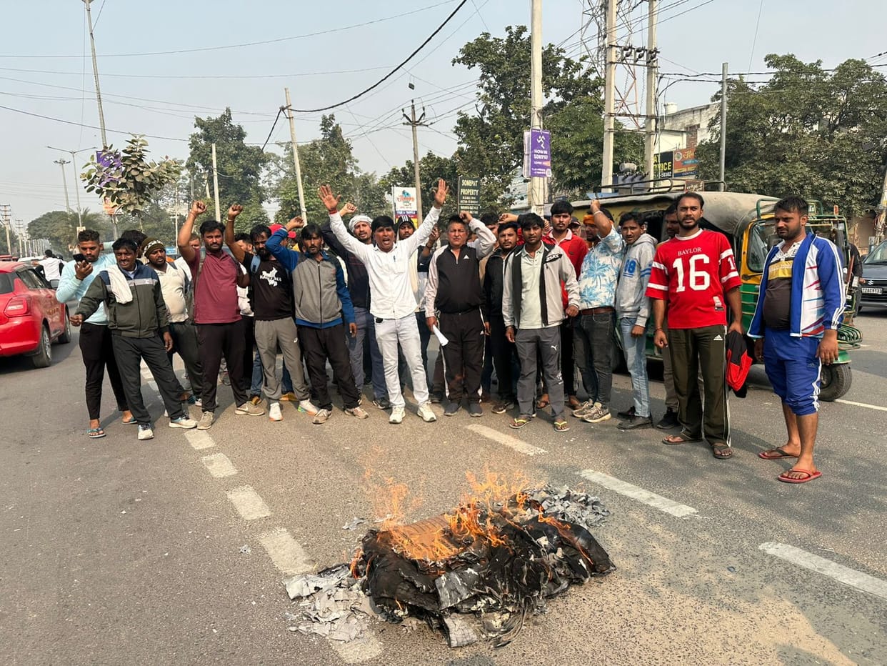 Contract workers took out a procession and burnt an effigy of the contract system