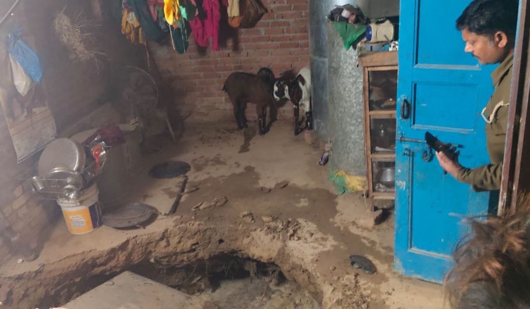 The floor inside the house caved in, leaving the family terrified as a deep pit formed.