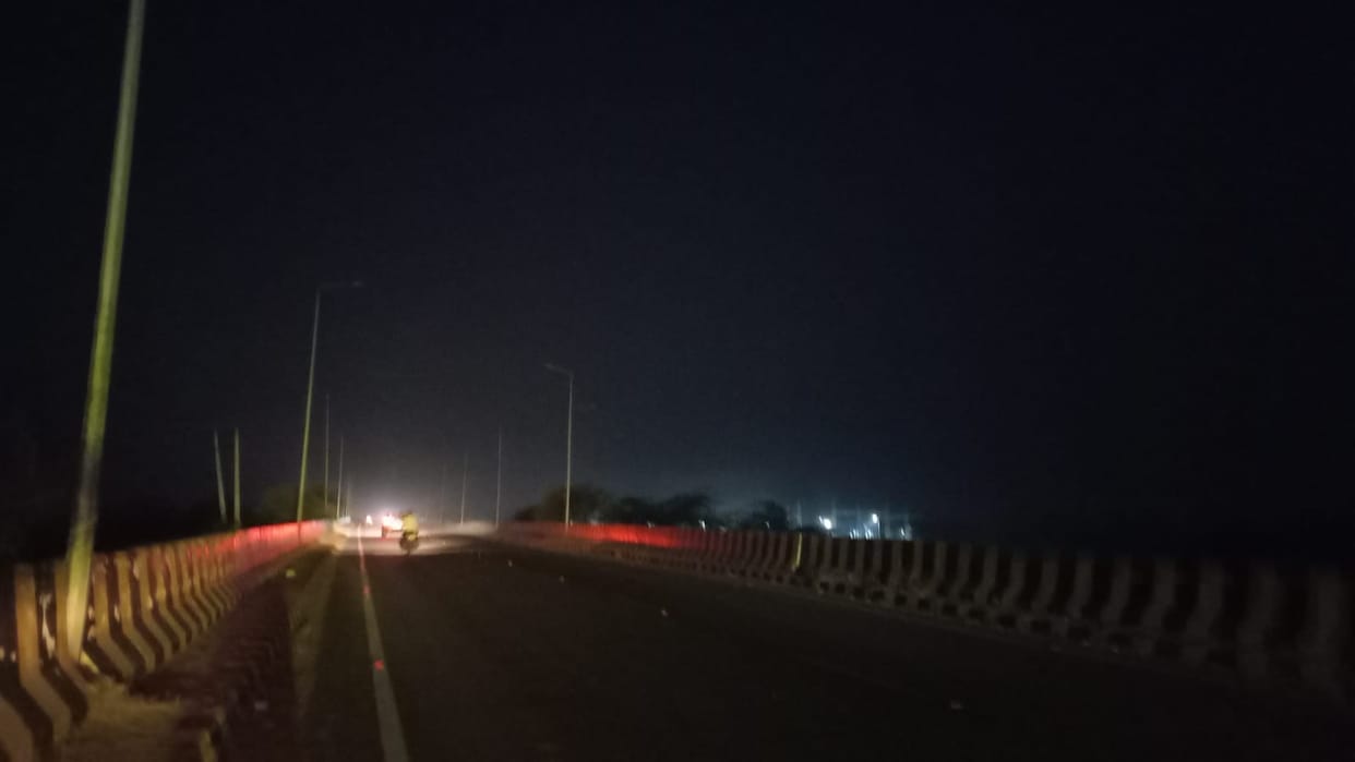 This is a city of darkness... streetlights are off on the city's flyovers, Rewari Road bypass is in darkness.