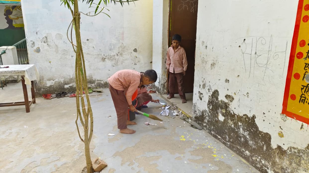 Students found sweeping the school