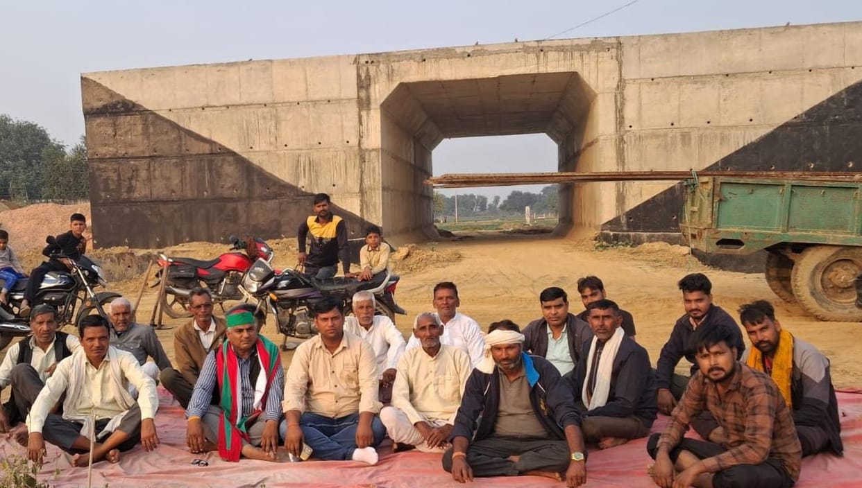 Farmers protest against the construction of a railway bridge