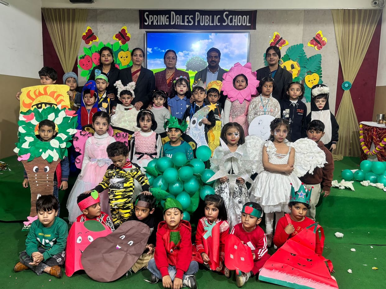 Students dressed as elephant, parrot, peacock, sheep and bird