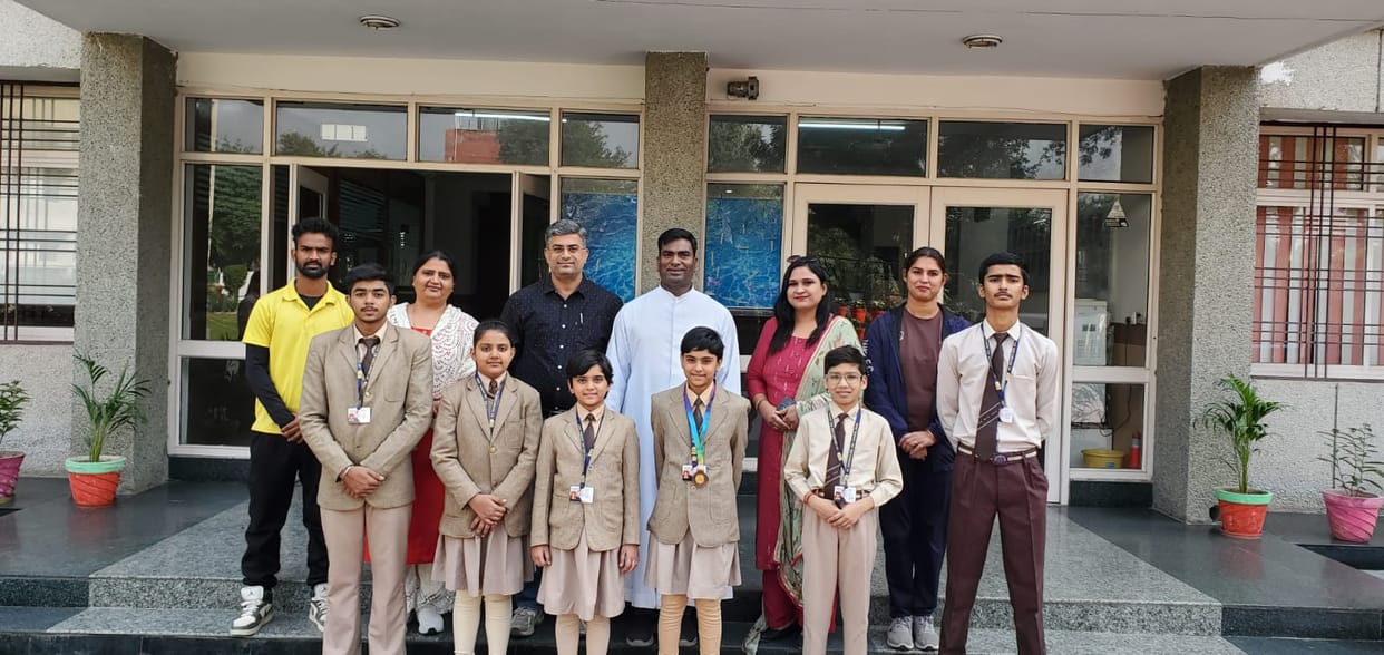 Medal winning students were honored in the badminton competition.