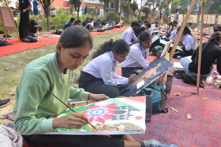 Students painted natural and cultural heritage on canvas.