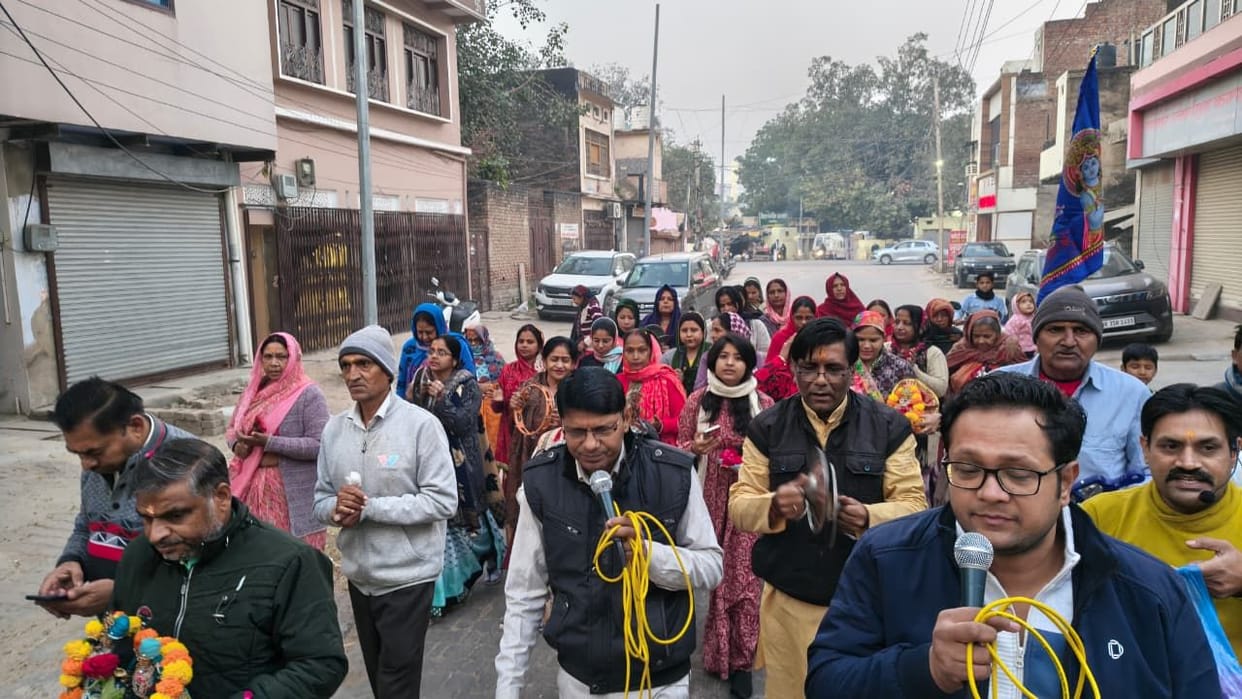 Devotees immersed in the devotion of Radha-Krishna