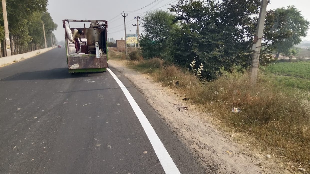 Work on white striping of roads has begun