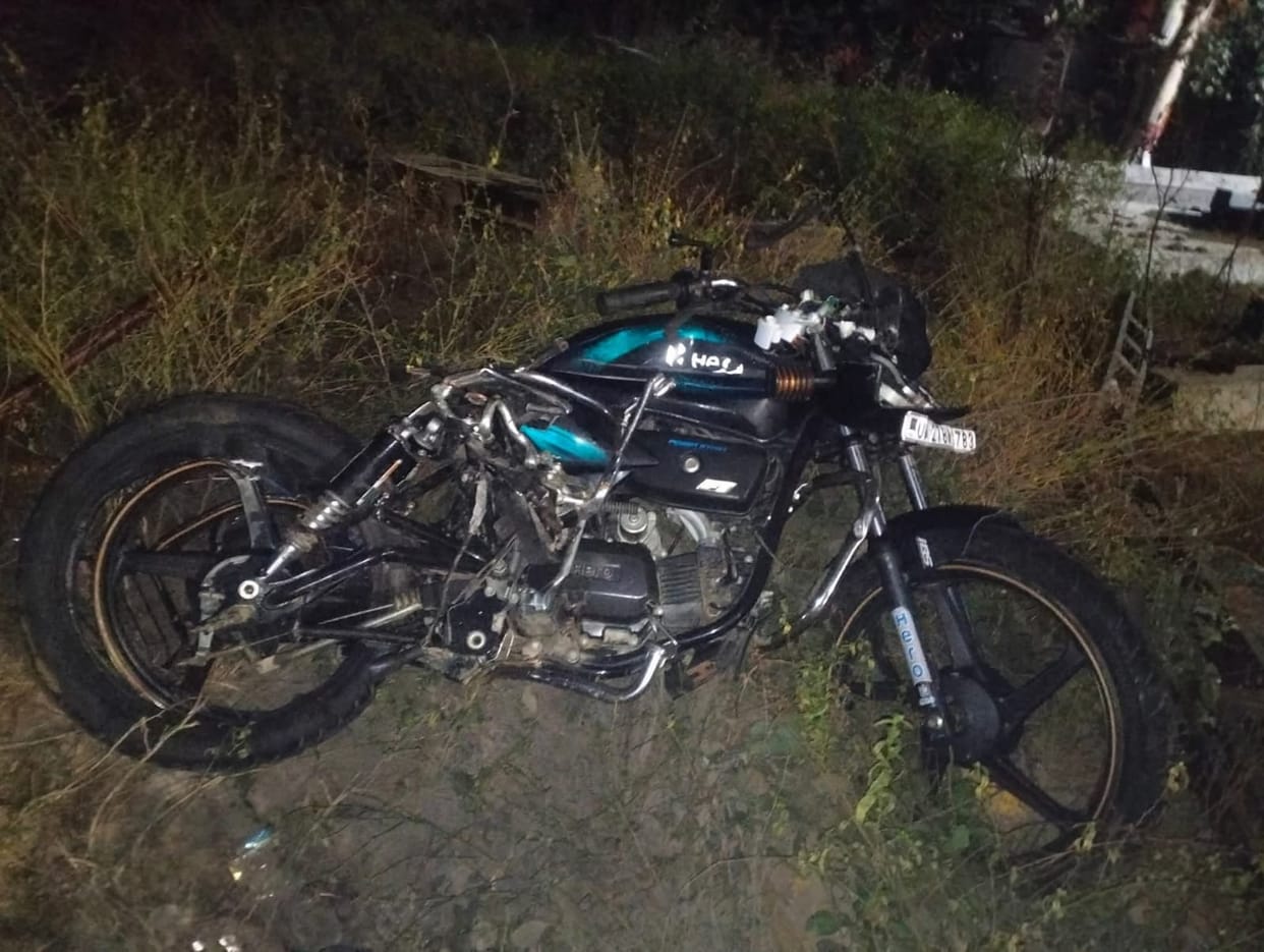 The bike was hit by the engine while crossing the tracks.