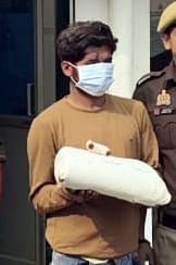 A smuggler was caught with opium worth Rs 20 lakh.