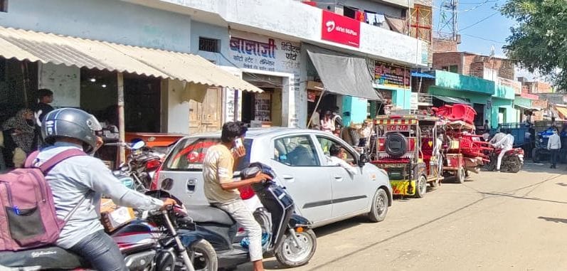 People remain stuck in traffic jams for hours at the main intersection of Bagran.