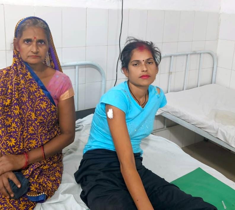 Dispute over splashing water, woman injured by bullet