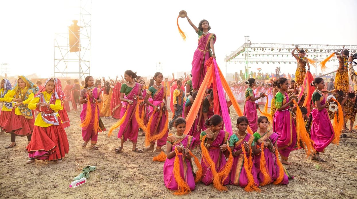 Set an example of humanity through teamwork and service: Anandiben