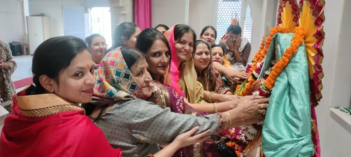 Women performed puja by singing bhajans