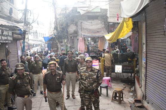 Dalmandi: Three-storey Sattar Katra is being demolished with a machine.