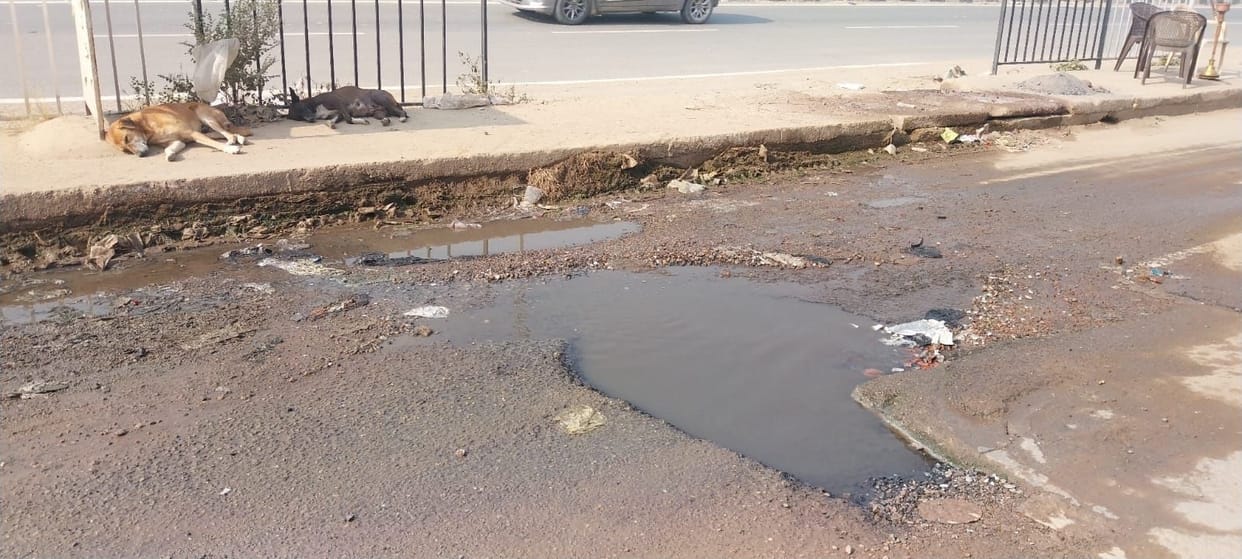 Sewerage overflow filled the service road with water, despite complaints no solution