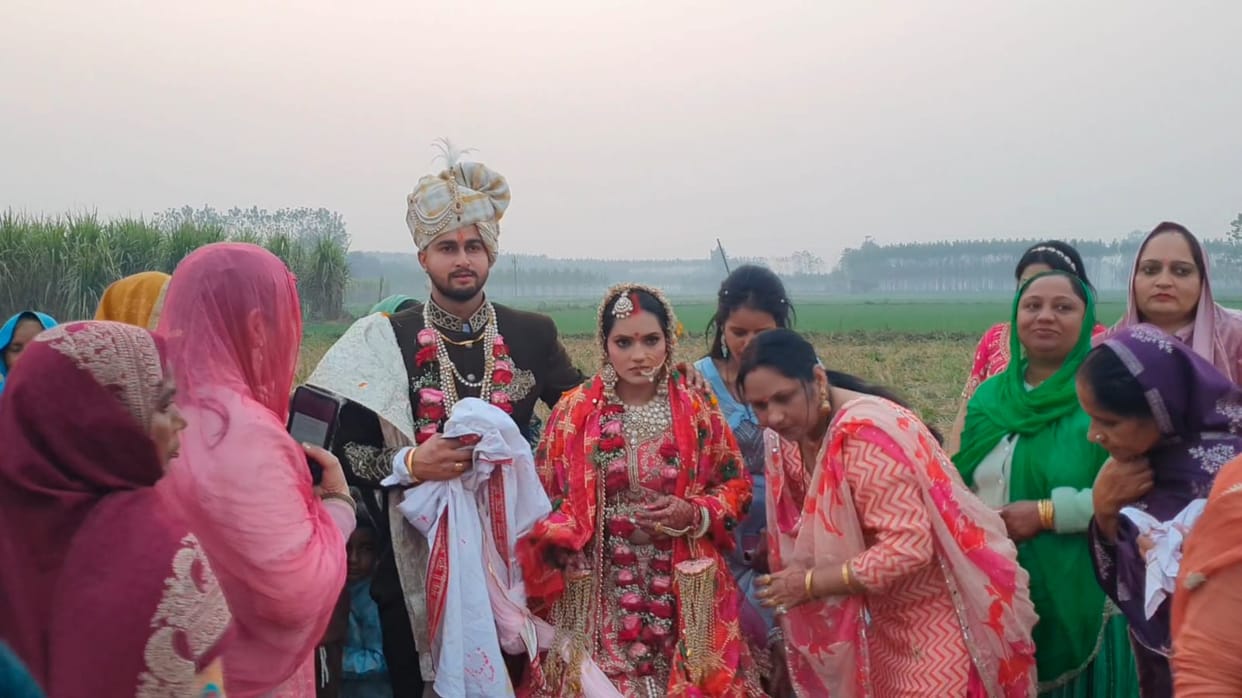 The groom arrived in the island village of Kamalpur with the bride by helicopter.