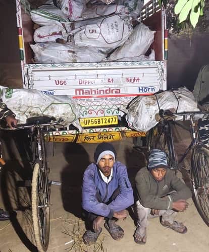 Two accused arrested with 52 sacks of incense wood loaded on a pickup