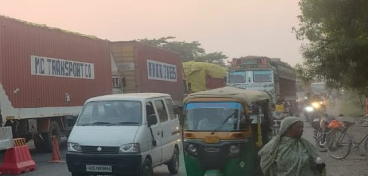 There is a jam on the highway, wheels are coming to a halt