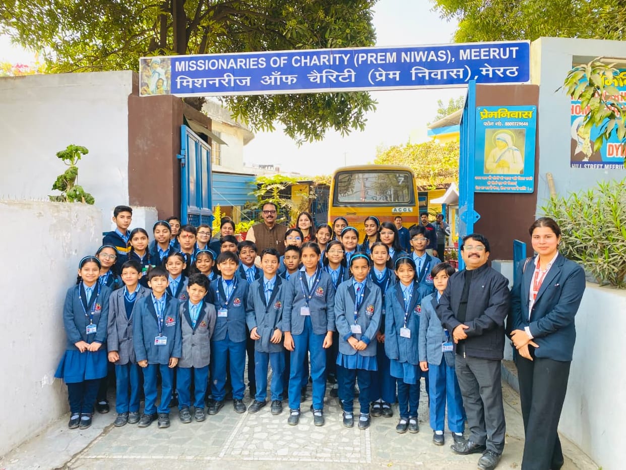 Students distributed donations to the old age home.