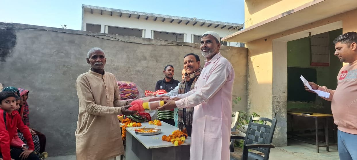 Distributed blankets to the needy