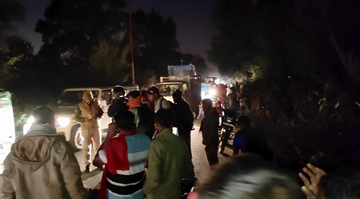 Woman crushed to death by truck, one injured