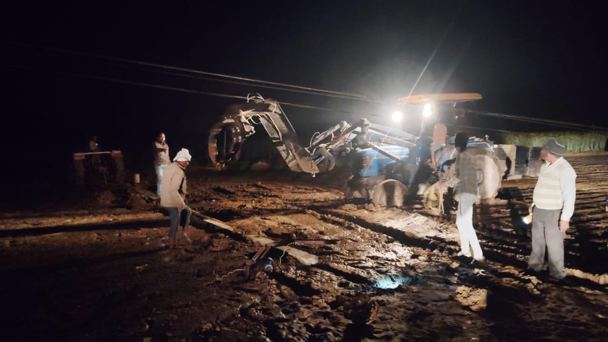 Three electric poles fell, causing power outage.